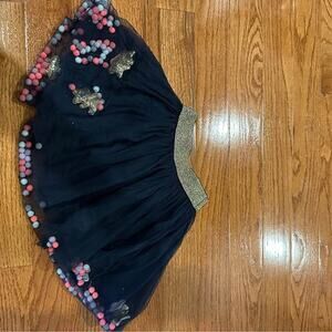 Girls skirt with pom poms and stars size 5-6